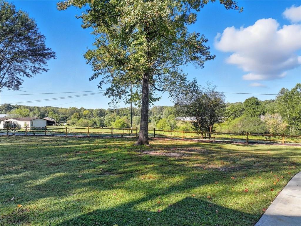 275 Old Whitestone Road West Talking Rock, GA 30175 - Photo 5 of 30 a view of a golf course with a lake view