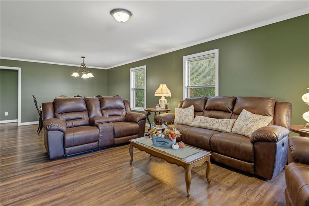 275 Old Whitestone Road West Talking Rock, GA 30175 - Photo 7 of 30 a living room with furniture and a large window