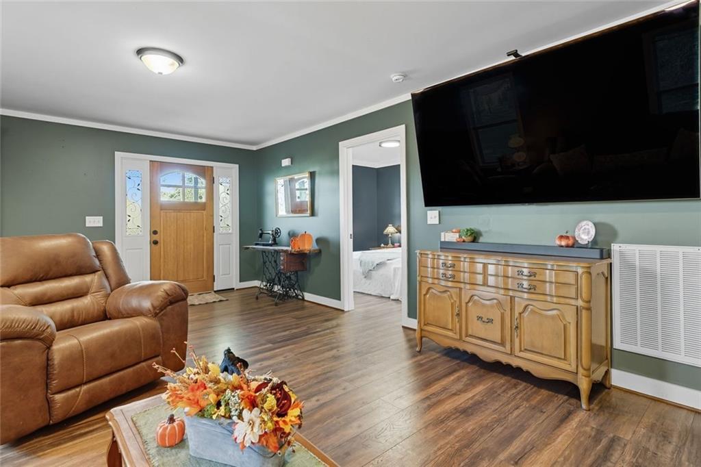 275 Old Whitestone Road West Talking Rock, GA 30175 - Photo 8 of 30 a living room with furniture fireplace and flat screen tv