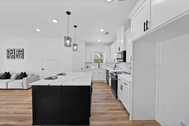 a large kitchen with a lot of counter space