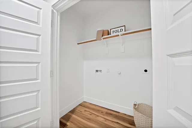 a view of a hallway with closet