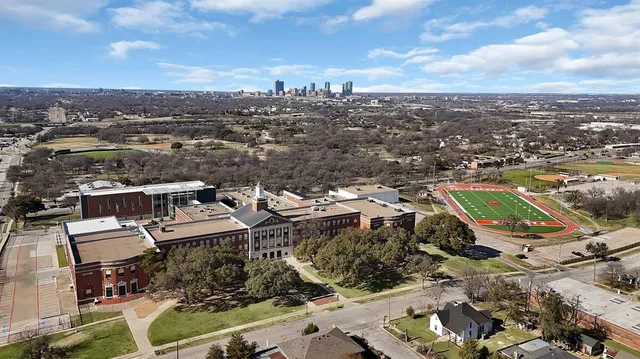 an aerial view of a house with a garden