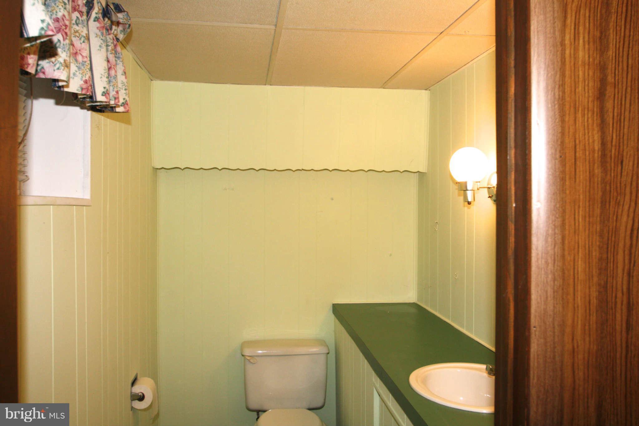 9223 Avondale Road Baltimore, MD 21234 - Photo 13 of 17 Bright half bath in basement