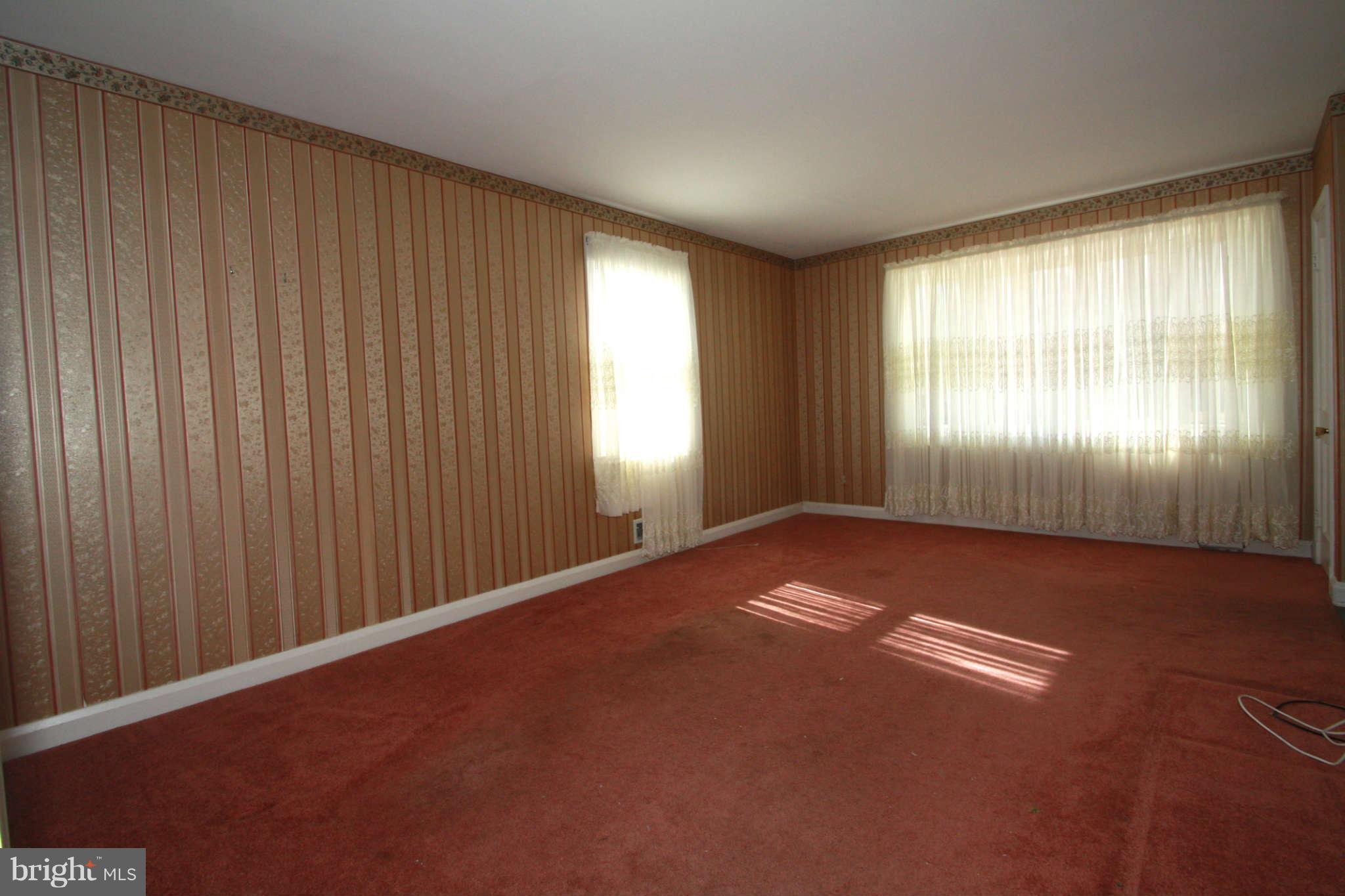 9223 Avondale Road Baltimore, MD 21234 - Photo 7 of 17 Living Room with lots of sunlight