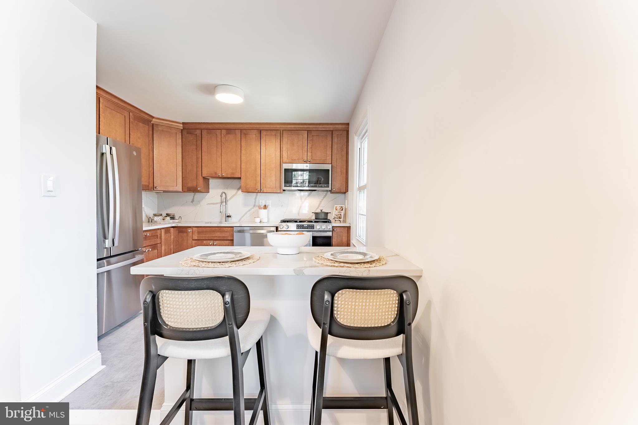 5480 Lighthouse Lane Burke, VA 22015 - Photo 3 of 36 Open kitchen with brand new quartz countertops
