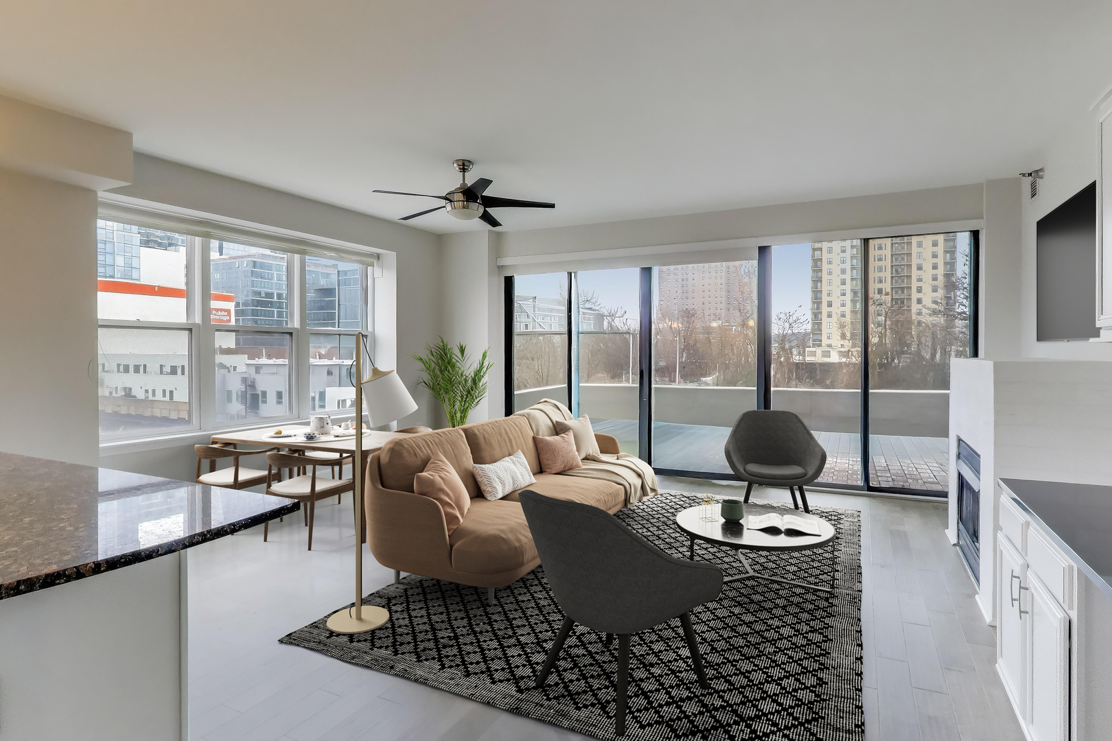 5 East 14th Place, Unit 501 Chicago, IL 60605 - Photo 11 of 37 a living room with furniture and a floor to ceiling window