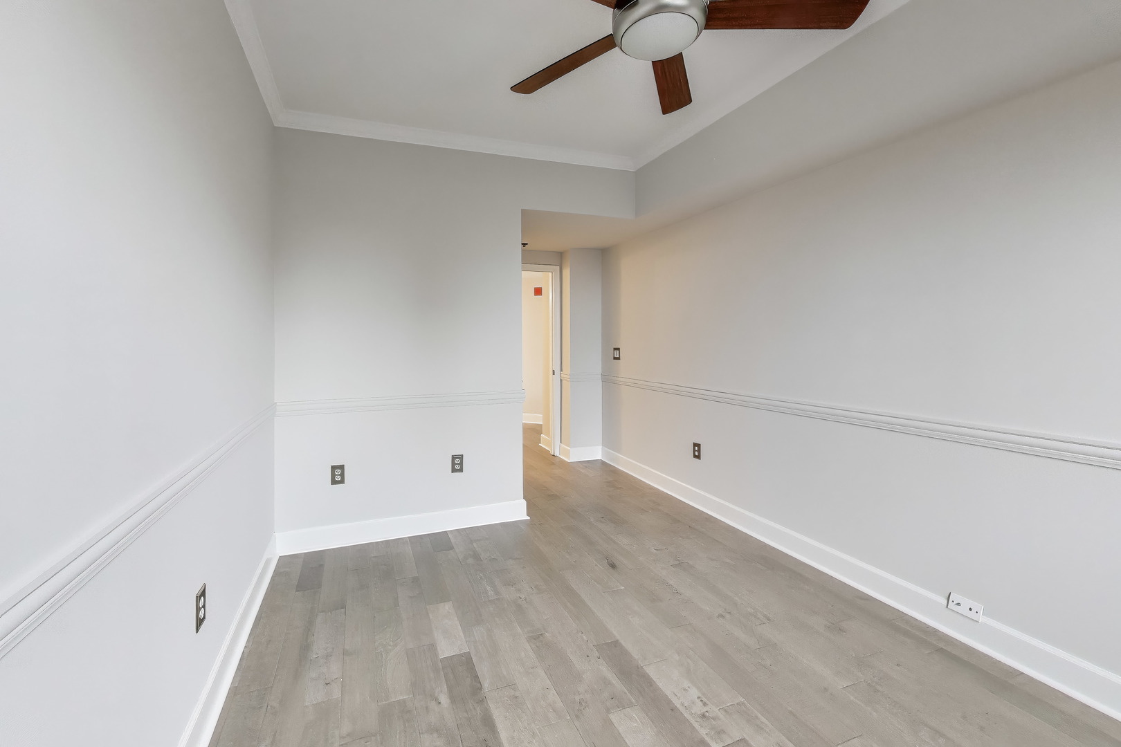 5 East 14th Place, Unit 501 Chicago, IL 60605 - Photo 26 of 37 wooden floor in an empty room