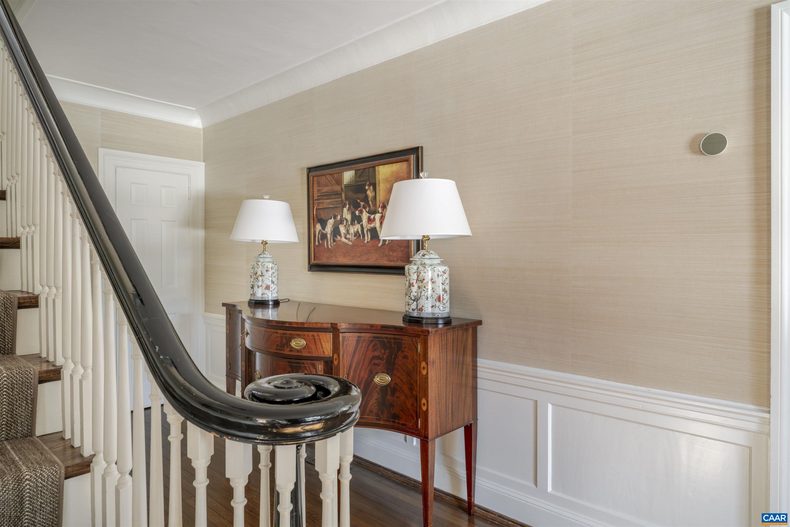 921 Rugby Road Charlottesville, VA 22903 - Photo 5 of 41 a view of a hallway with seating area