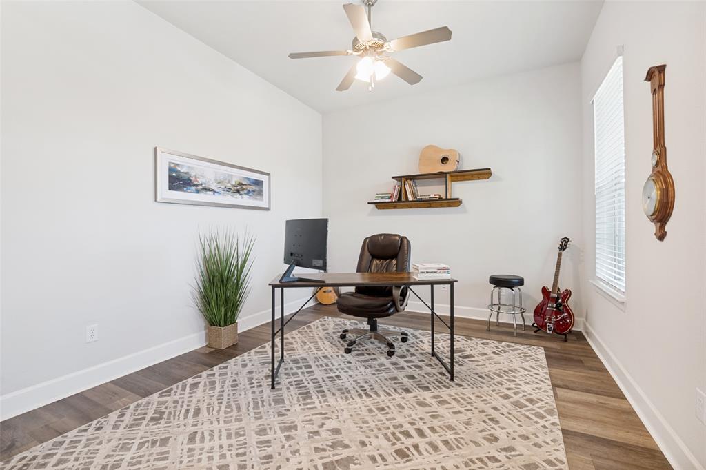4724 Raspberry Spar Court Arlington, TX 76005 - Photo 7 of 40 a workspace with furniture