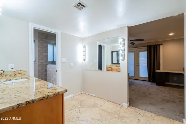 a bathroom with a shower and a bathtub