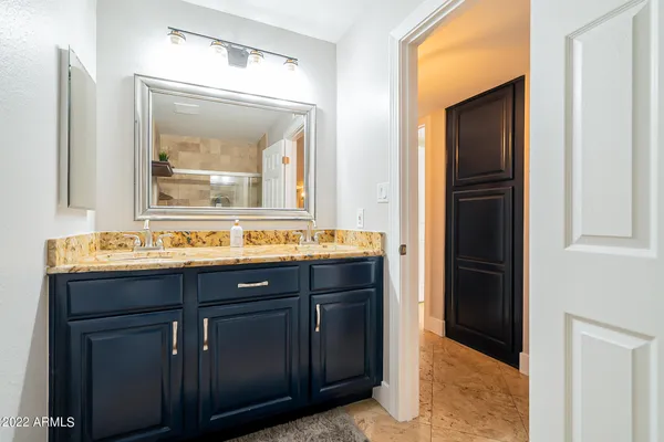 a view of a backyard with large trees