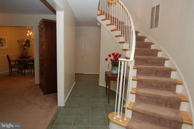 8311 Garfield Court Springfield, VA 22152 - Photo 10 of 21 Grand Curved Stairway Entrance