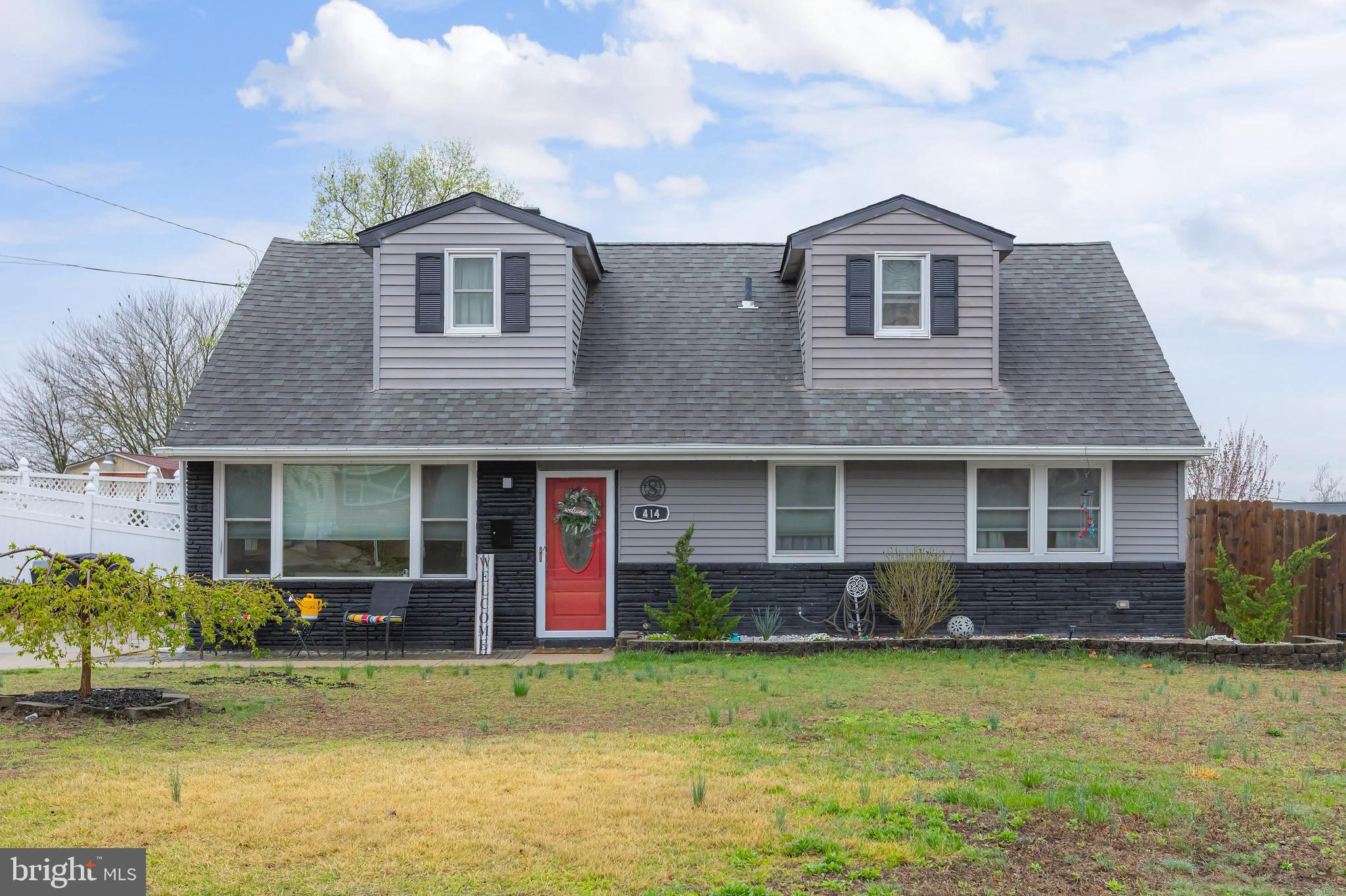 414 Westminster Road Wenonah, NJ 08090 - Photo 1 of 21 a front view of a house with garden
