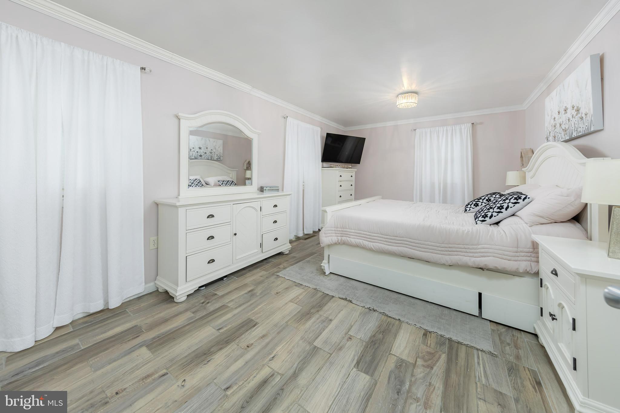414 Westminster Road Wenonah, NJ 08090 - Photo 8 of 21 a bedroom with a bed and a dresser