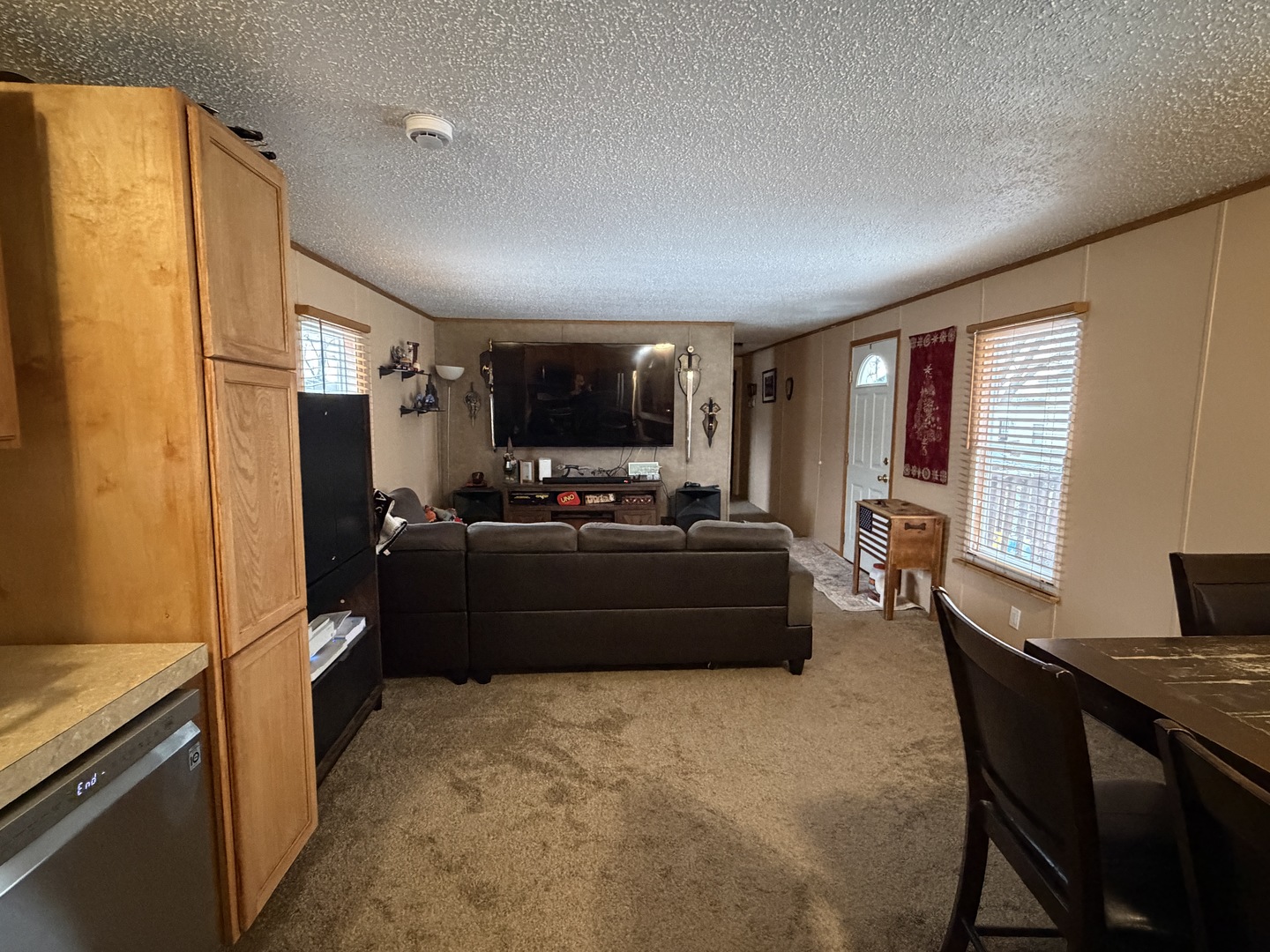 35 Cedar Street Minooka, IL 60447 - Photo 4 of 10 a living room with furniture and a flat screen tv
