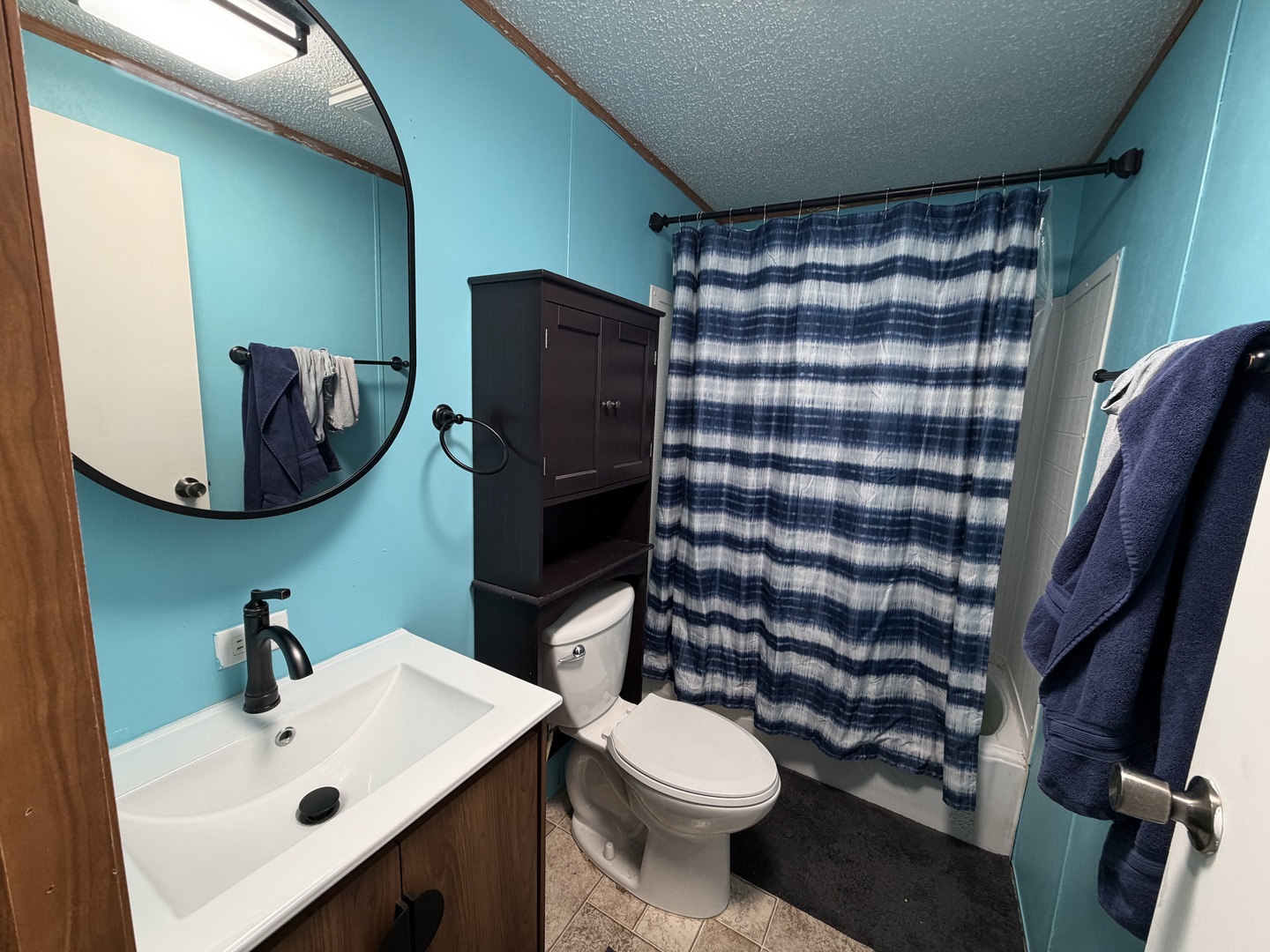 35 Cedar Street Minooka, IL 60447 - Photo 6 of 10 a bathroom with a sink toilet and mirror