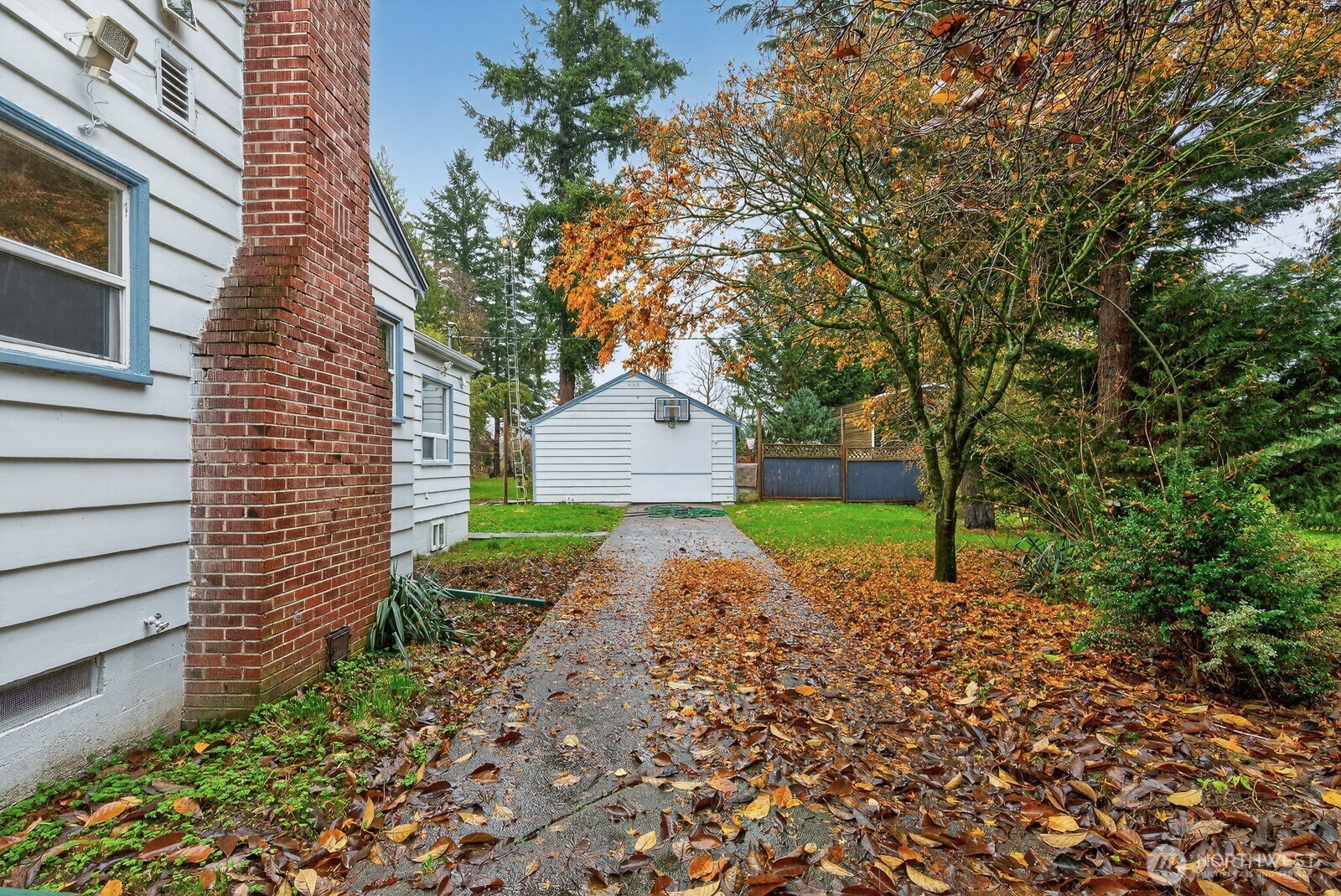 7554 Nooksack Road Everson, WA 98247 - Photo 18 of 40 a backyard of a house with a garden and entertaining space