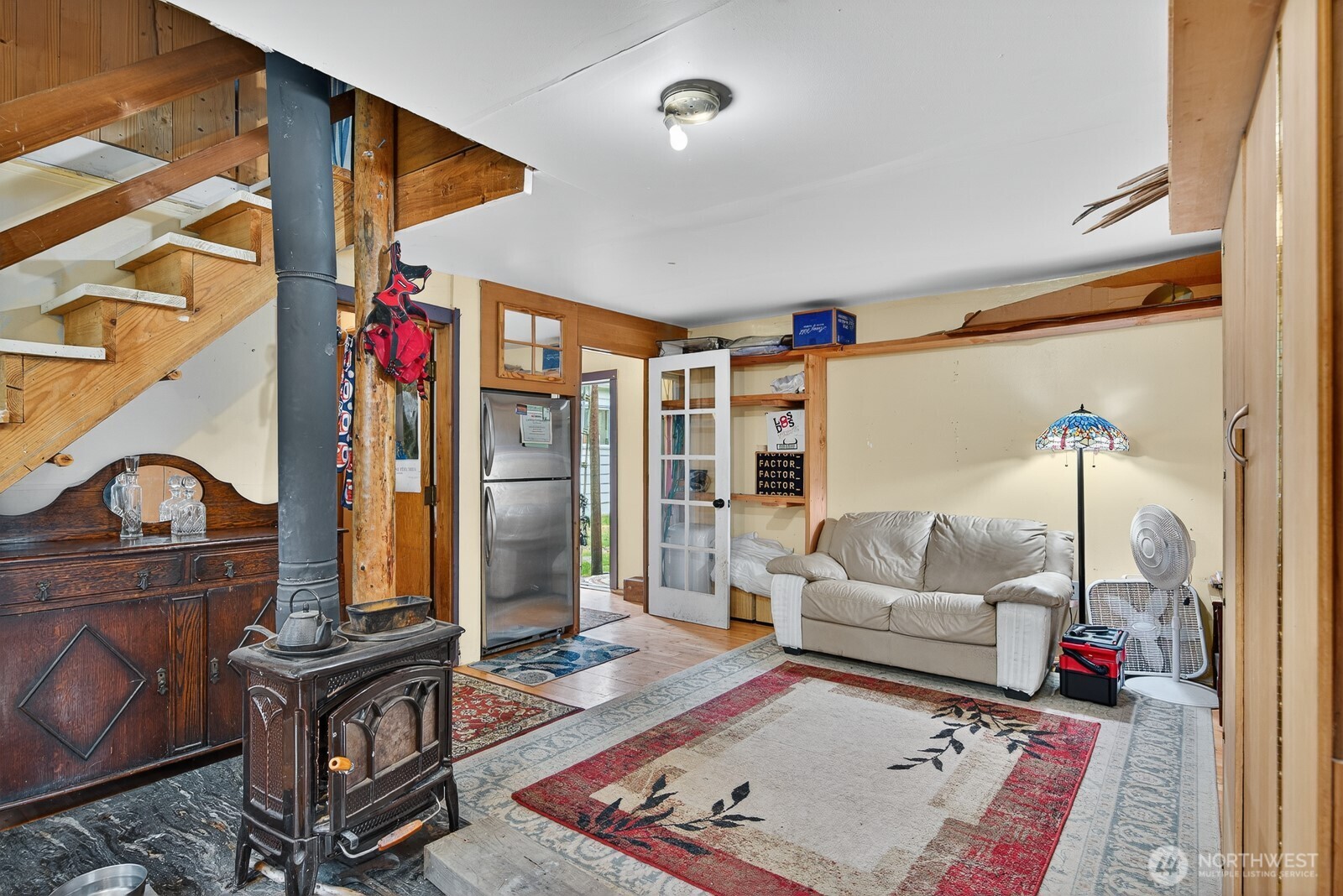 7554 Nooksack Road Everson, WA 98247 - Photo 21 of 40 a living room with furniture a rug and a piano