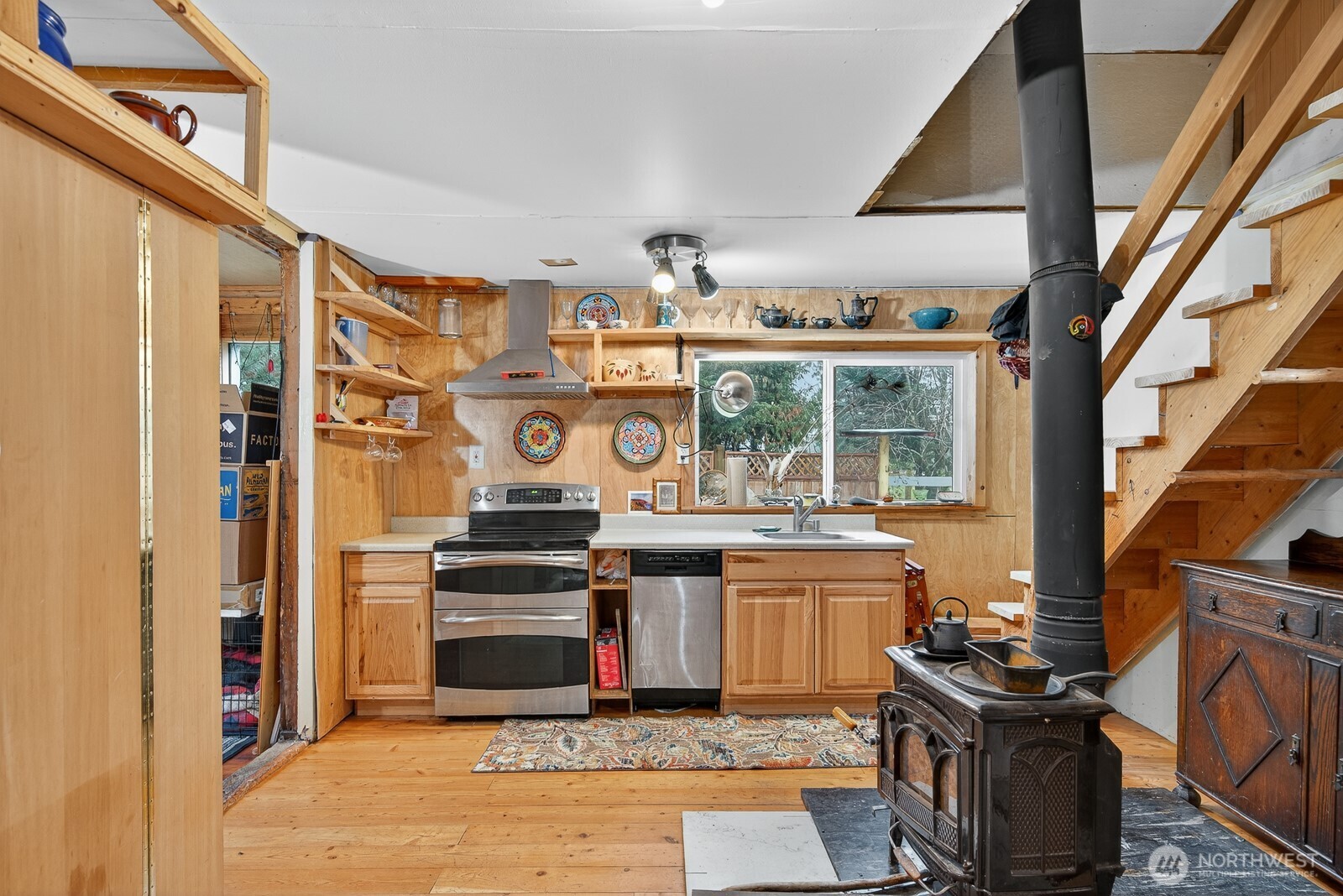 7554 Nooksack Road Everson, WA 98247 - Photo 23 of 40 a kitchen with a stove and a refrigerator