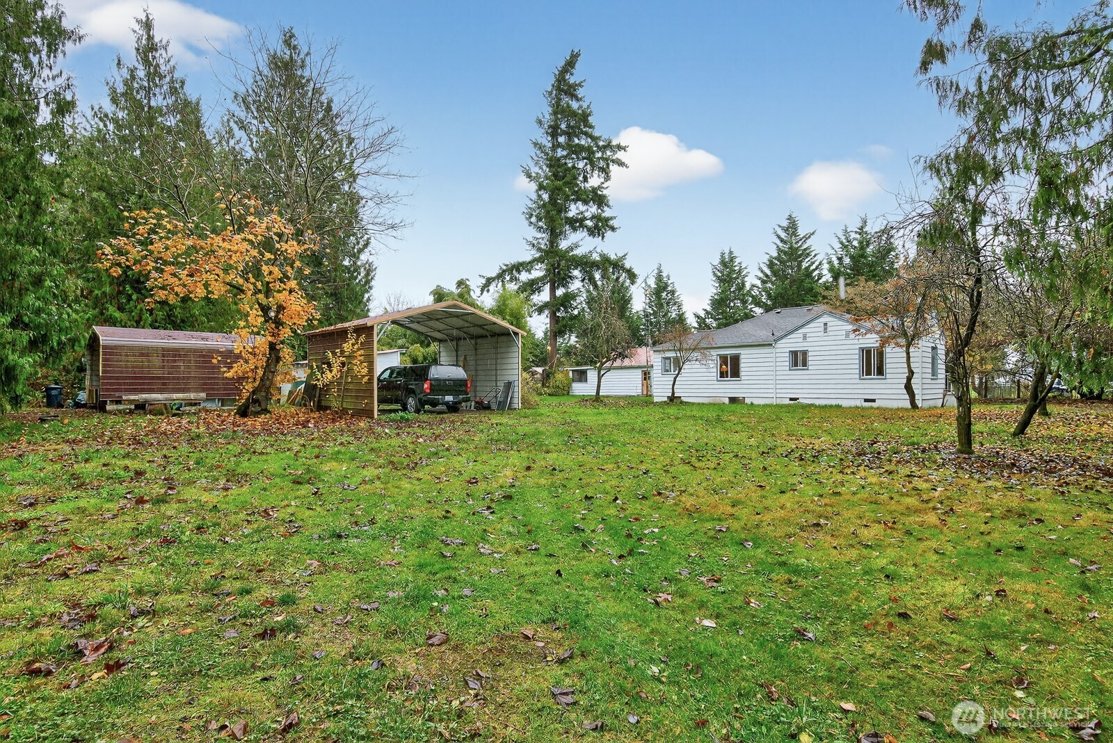 7554 Nooksack Road Everson, WA 98247 - Photo 29 of 40 a view of a house with backyard and trees