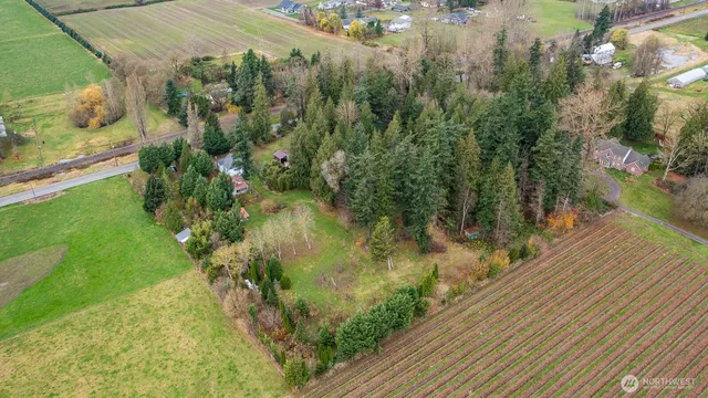 a view of a lake with a yard