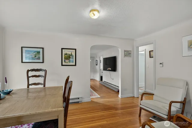 a view of a livingroom with furniture and a flat screen tv