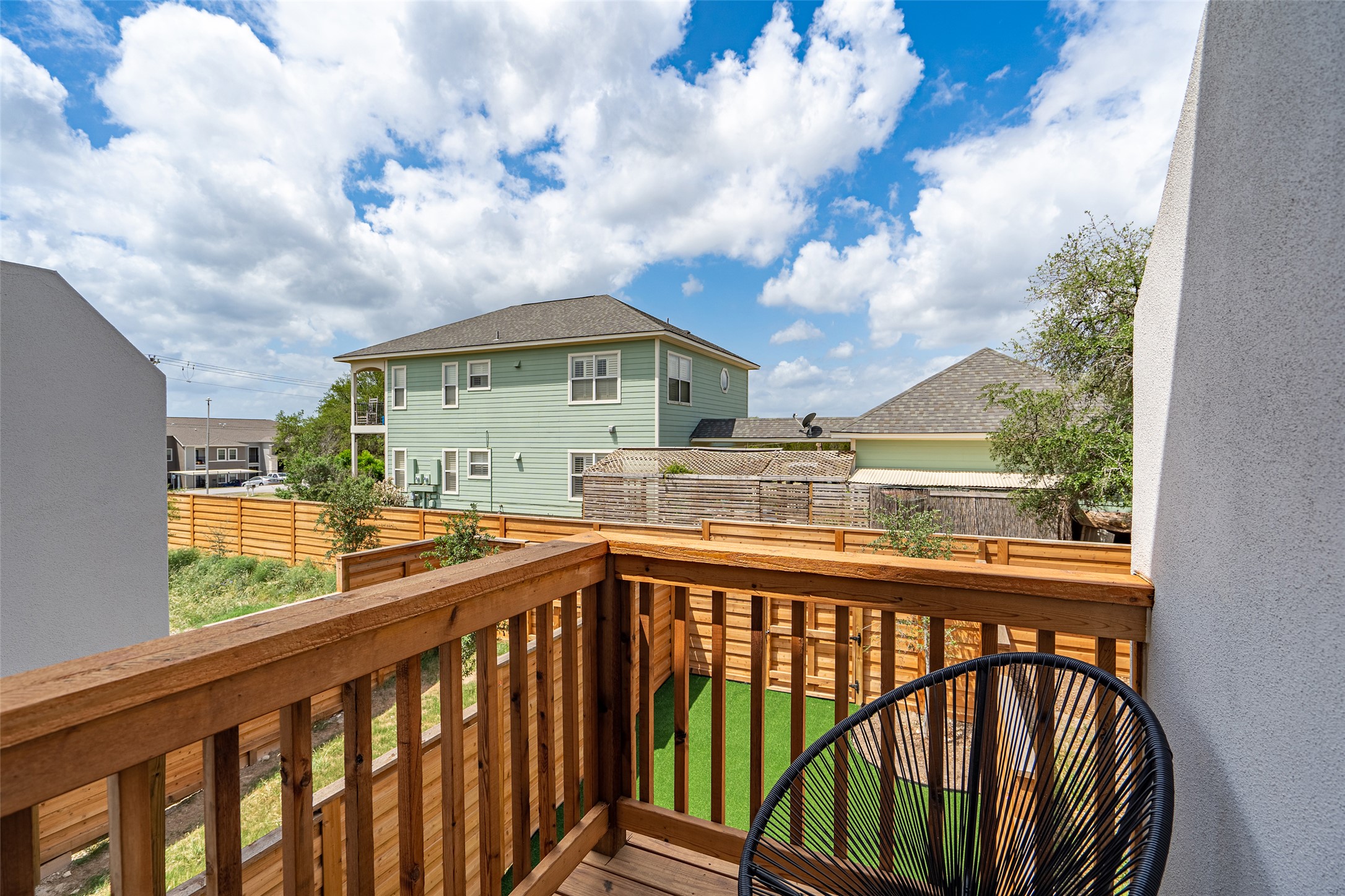 21202 Boggy Ford Road, Unit 6 Lago Vista, TX 78645 - Photo 27 of 36 a view of city from a balcony