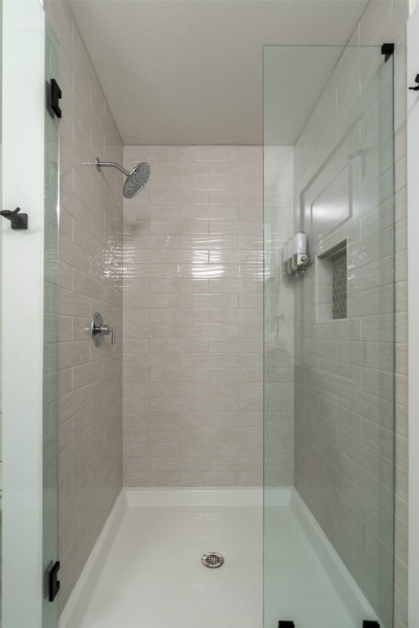 21202 Boggy Ford Road, Unit 6 Lago Vista, TX 78645 - Photo 30 of 36 a bathroom with a shower