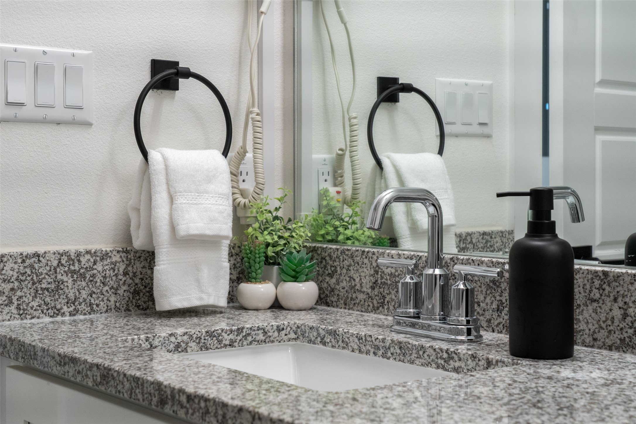 21202 Boggy Ford Road, Unit 6 Lago Vista, TX 78645 - Photo 6 of 36 a close view of light fixtures and a sink