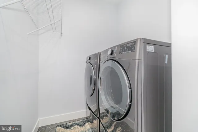 a balcony with wooden floor and furniture