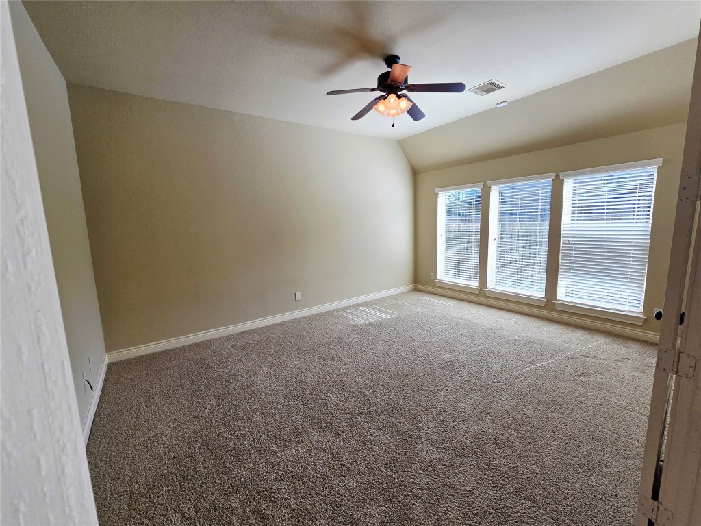 4311 Piper Shadow Lane Katy, TX 77494 - Photo 16 of 29 a view of an empty room with a window
