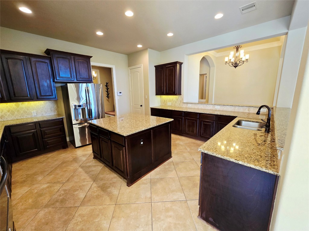 4311 Piper Shadow Lane Katy, TX 77494 - Photo 17 of 29 a spacious bathroom with a granite countertop sink and a mirror