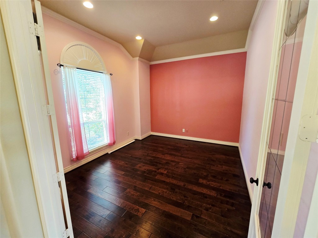 4311 Piper Shadow Lane Katy, TX 77494 - Photo 4 of 29 a view of empty room with wooden floor and fan