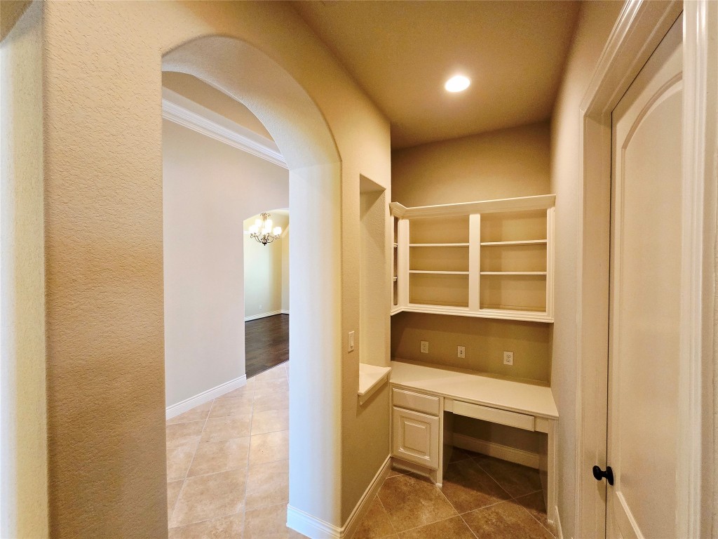 4311 Piper Shadow Lane Katy, TX 77494 - Photo 9 of 29 a view of walk in closet and wooden floor