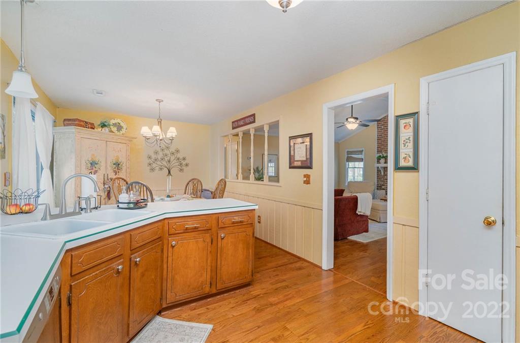 6901 Porterfield Road Charlotte, NC 28226 - Photo 17 of 30 a view of a kitchen with sink and cabinets