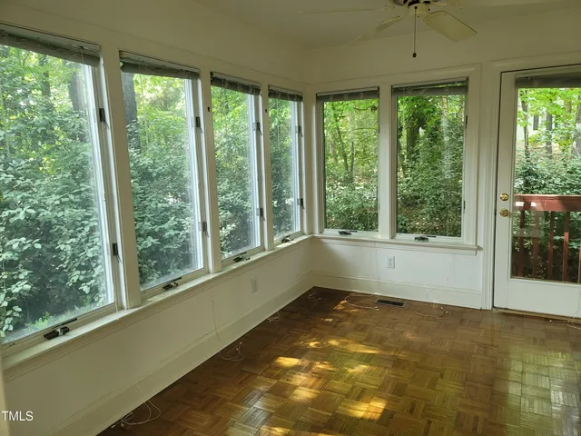 an empty room with windows