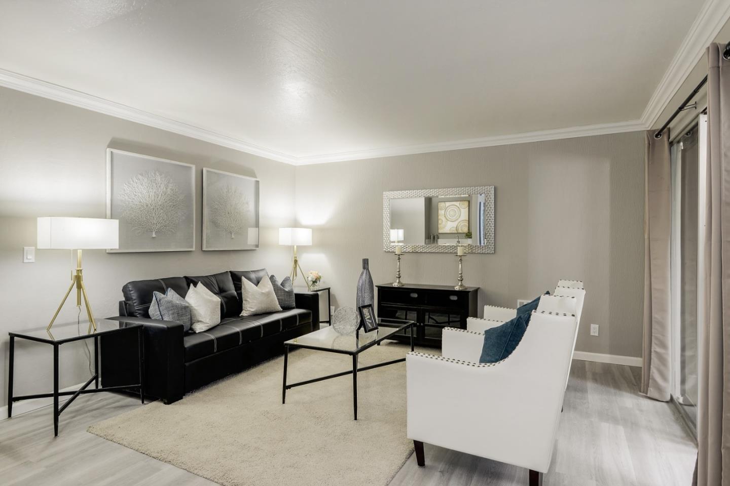 100 East Middlefield Road, Unit 1B Mountain View, CA 94043 - Photo 6 of 18 a living room with furniture and a potted plant