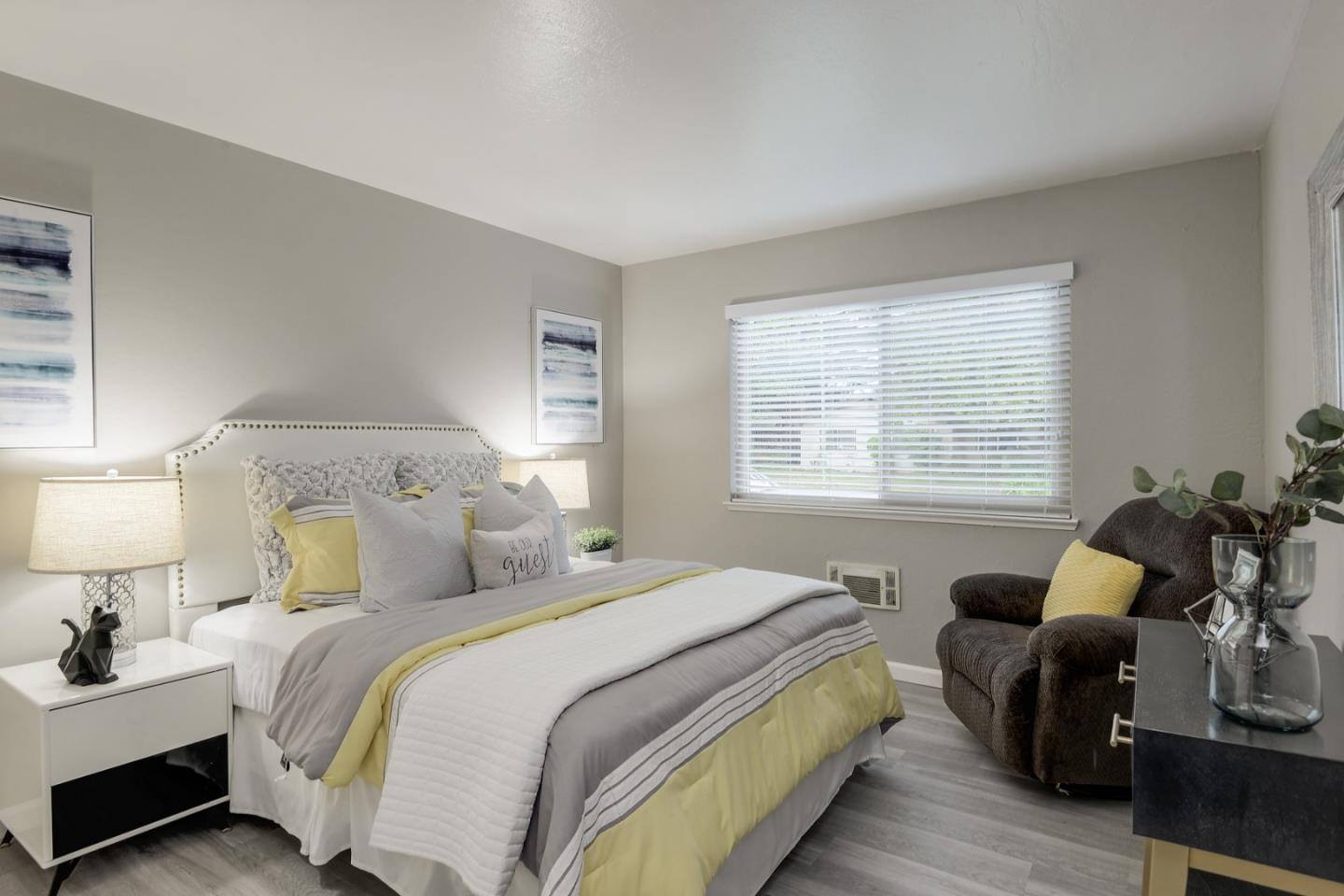 100 East Middlefield Road, Unit 1B Mountain View, CA 94043 - Photo 8 of 18 a bedroom with double bed and a lamp