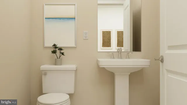 a view of living room with furniture and a window