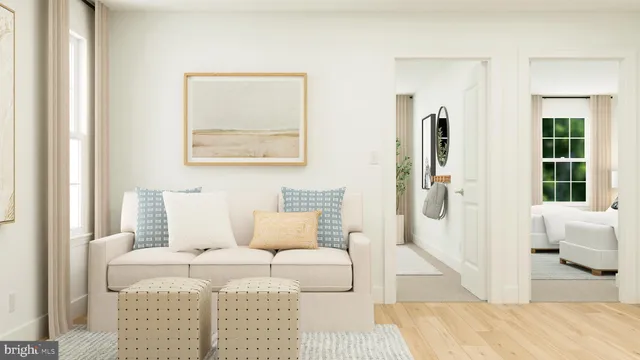 a living room with furniture and a window