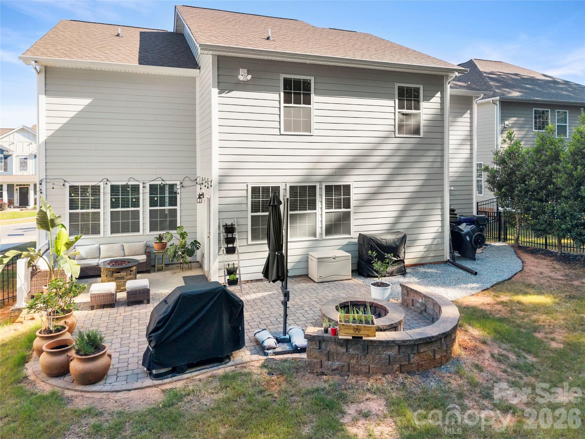 11266 Trailside Road Concord, NC 28027 - Photo 45 of 48 a view of a house with backyard and sitting area