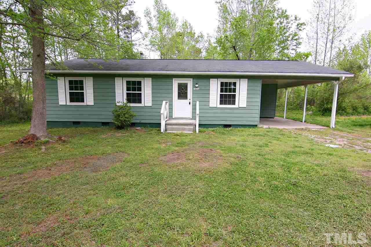 7033 Buck Road Wendell, NC 27591 - Photo 1 of 25 front view of a house with a yard