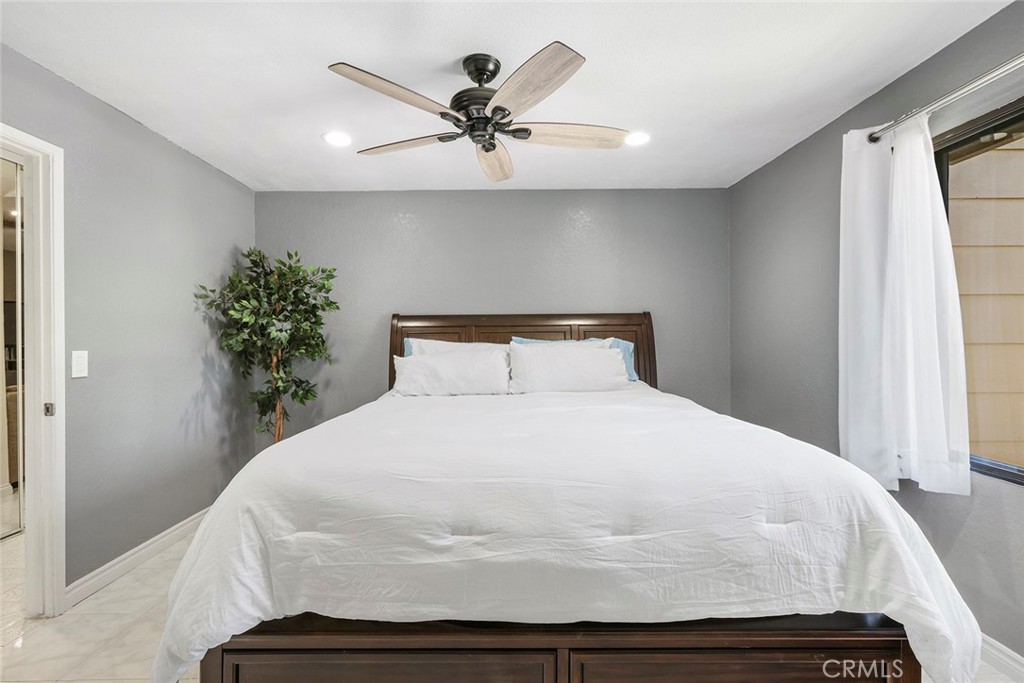 20702 El Toro Road, Unit 226 Lake Forest, CA 92630 - Photo 11 of 39 a bedroom with a bed and a window