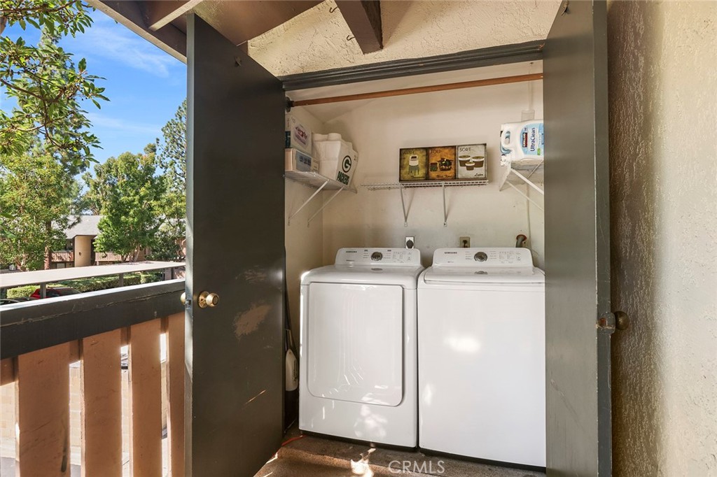 20702 El Toro Road, Unit 226 Lake Forest, CA 92630 - Photo 17 of 39 a utility room with dryer and washer
