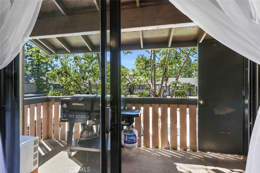 20702 El Toro Road, Unit 226 Lake Forest, CA 92630 - Photo 18 of 39 a front view of a house with a porch