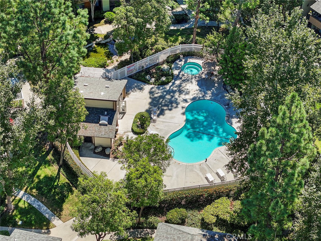 20702 El Toro Road, Unit 226 Lake Forest, CA 92630 - Photo 25 of 39 an aerial view of a house with a yard and garden