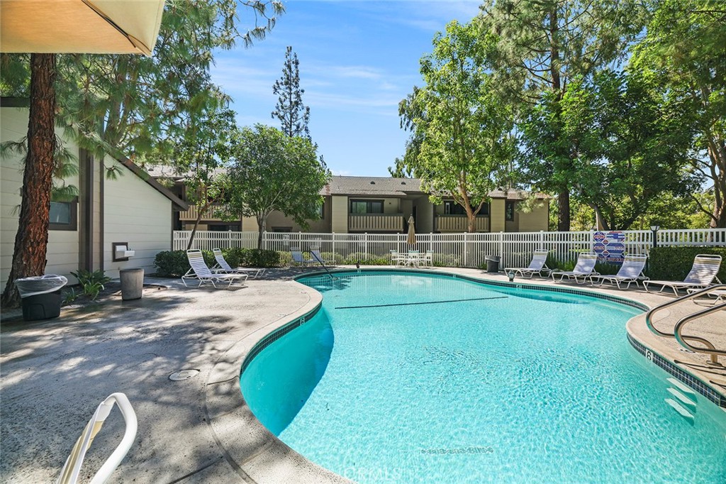 20702 El Toro Road, Unit 226 Lake Forest, CA 92630 - Photo 36 of 39 a view of a swimming pool with a patio