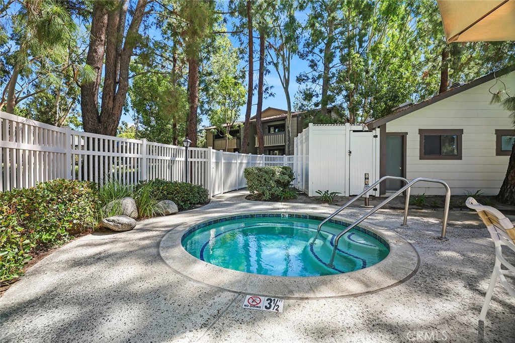 20702 El Toro Road, Unit 226 Lake Forest, CA 92630 - Photo 37 of 39 a view of a house with swimming pool