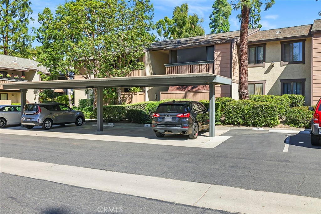 20702 El Toro Road, Unit 226 Lake Forest, CA 92630 - Photo 38 of 39 a car parked in front of a house