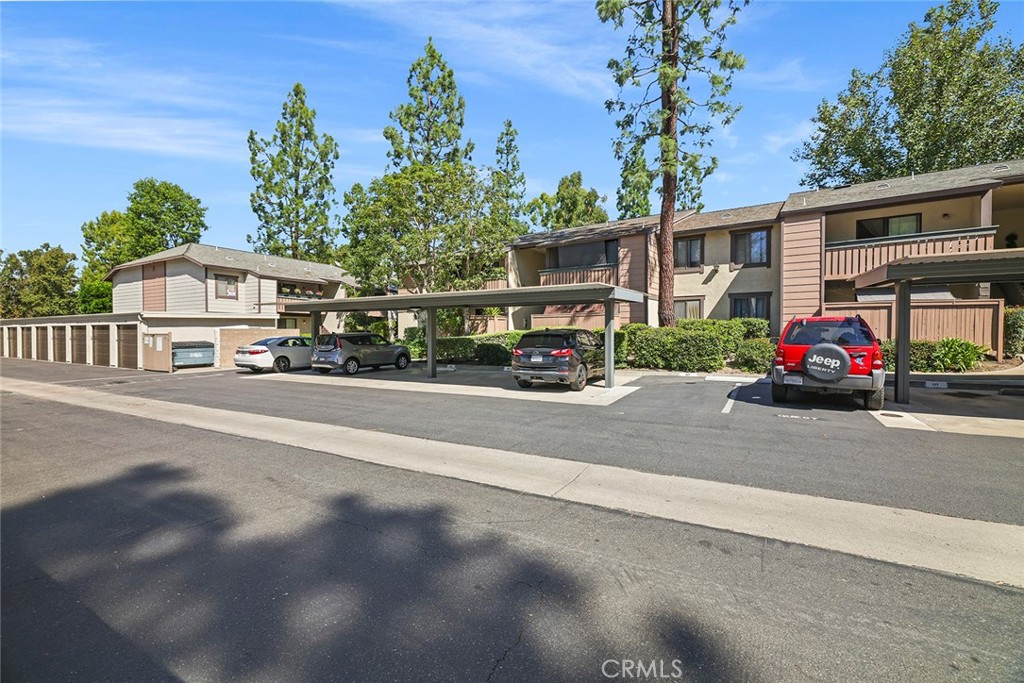 20702 El Toro Road, Unit 226 Lake Forest, CA 92630 - Photo 39 of 39 a car parked in front of a house